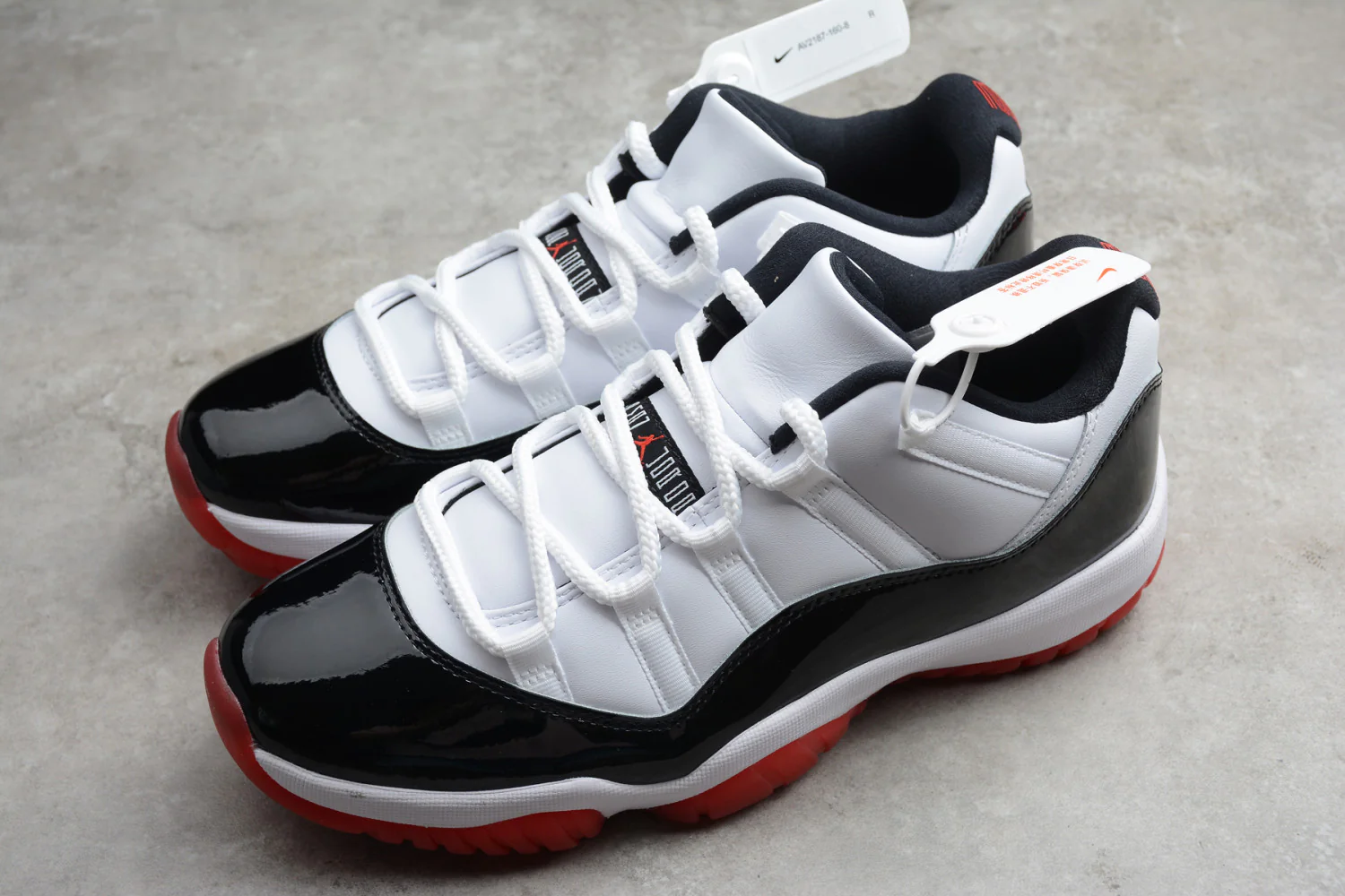Air Jordan 11 Low Black Red AV2187-160 - Image 13