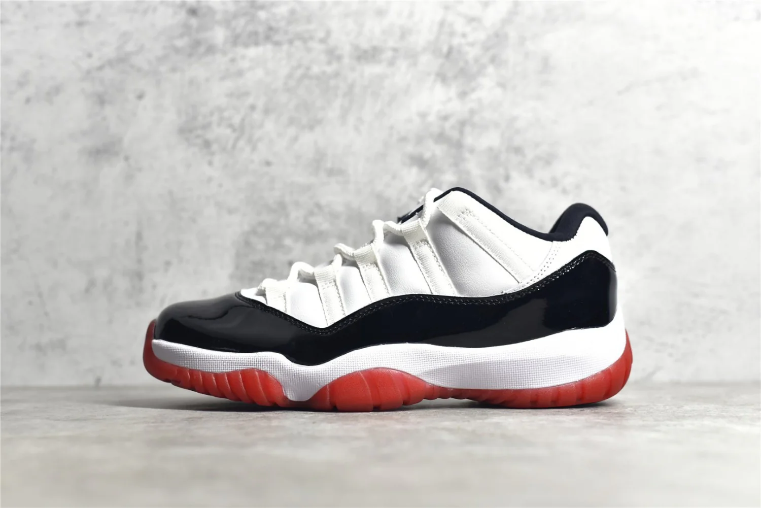 Air Jordan 11 Low Black Red AV2187-160 - Image 7