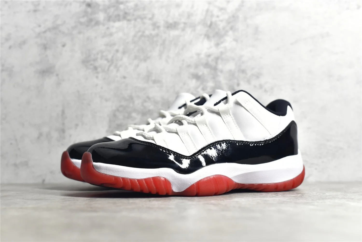 Air Jordan 11 Low Black Red AV2187-160 - Image 8
